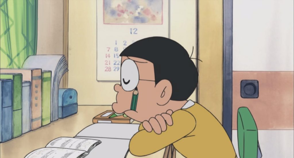 Hình ảnh Nobita đang lười học bài